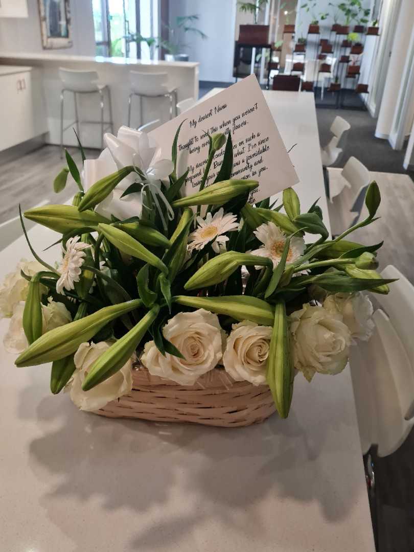 Sympathy flowers in basket